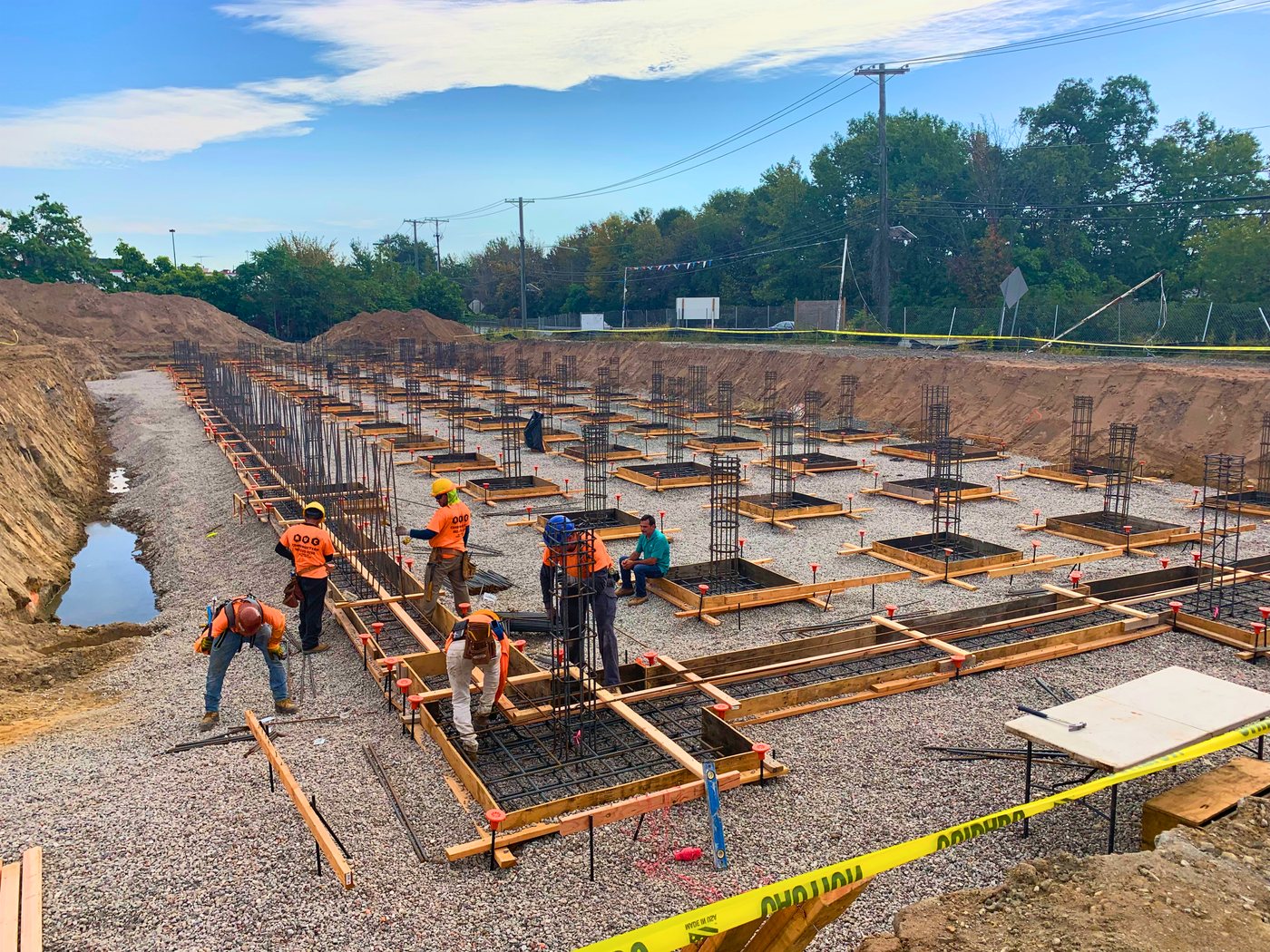 Valley Construction crew placing foundations and footing rebar on a ground-up project site
