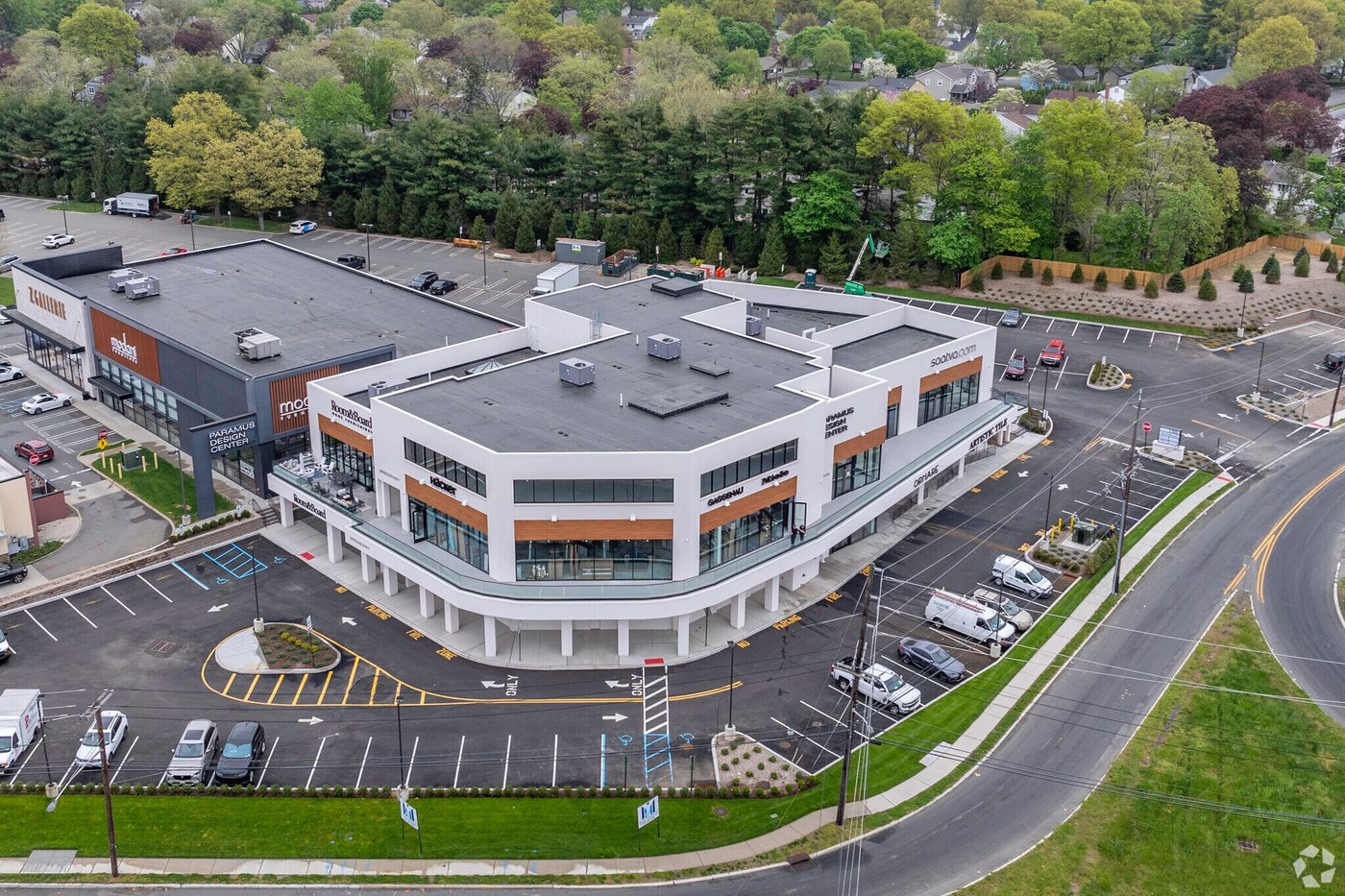 Aerial view of a modern mixed-use commercial development completed by Valley Construction